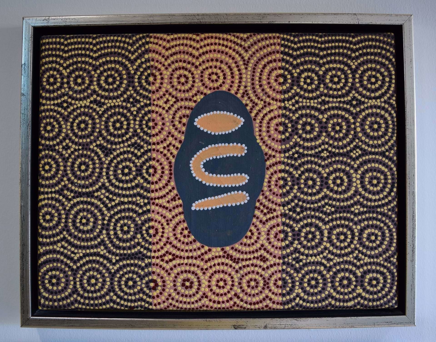 billede af australske aboriginals med skolens logo